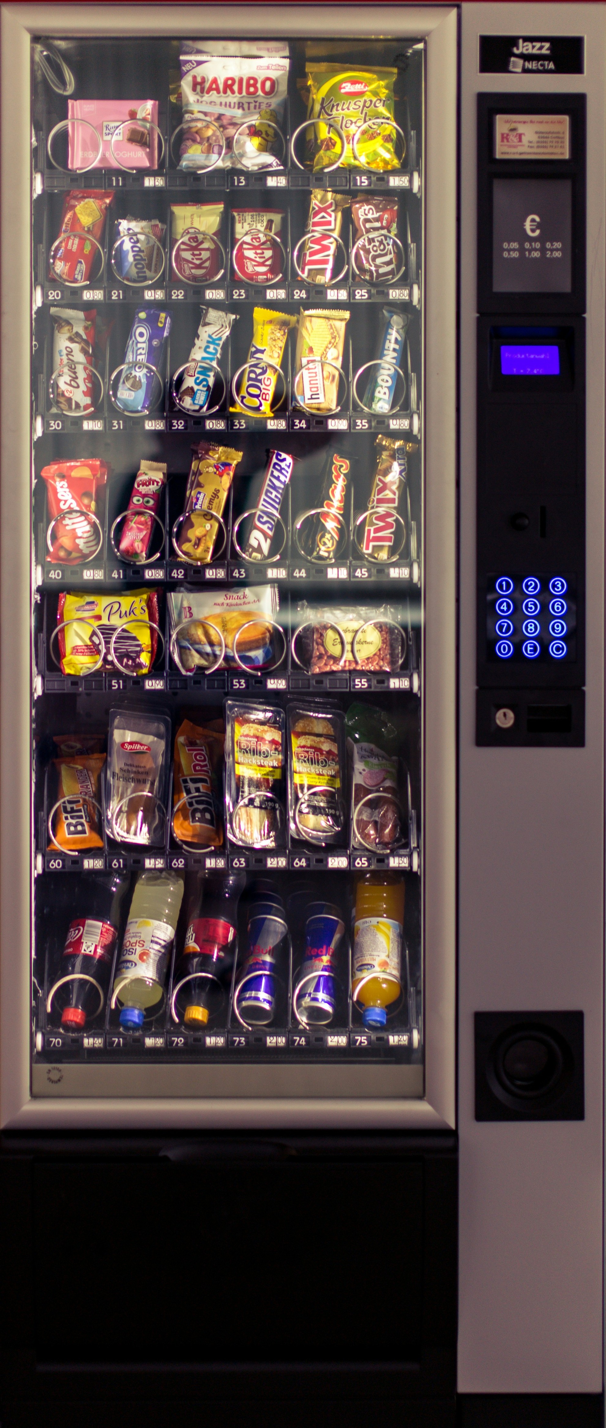 Person using vending machine